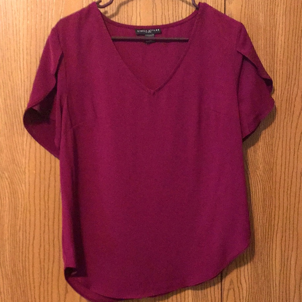 Simply styled burgundy blouse, size M.